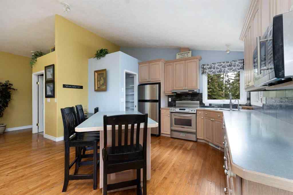 MLS® A2247035 - 115 Community Lane  in Saprae Creek Estates Saprae Creek, Residential