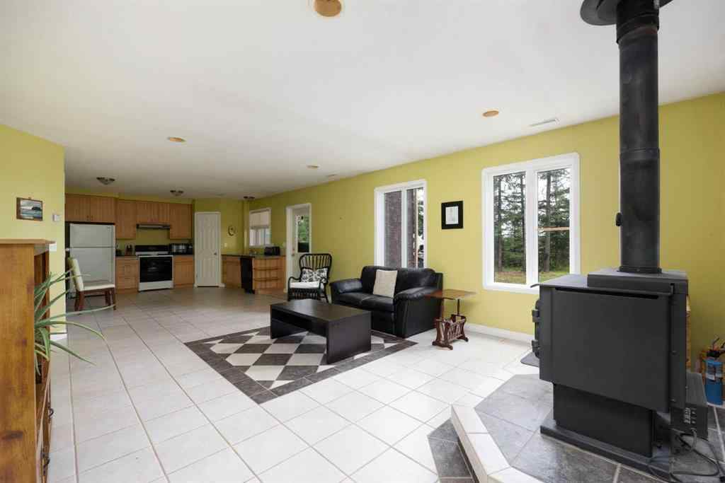 MLS® A2247035 - 115 Community Lane  in Saprae Creek Estates Saprae Creek, Residential