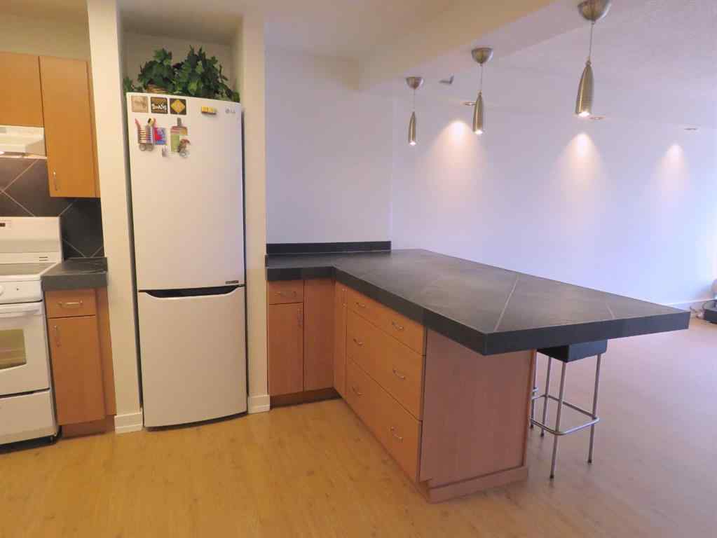MLS® A2247053 - Unit #204 328 Cedar Crescent SW in Spruce Cliff Calgary, Residential