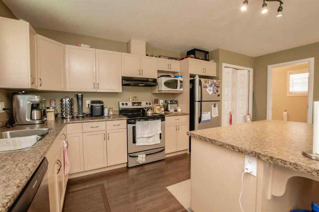 MLS® A2247065 - Unit #A&B 10028 104 Avenue  in Avondale Grande Prairie, Residential