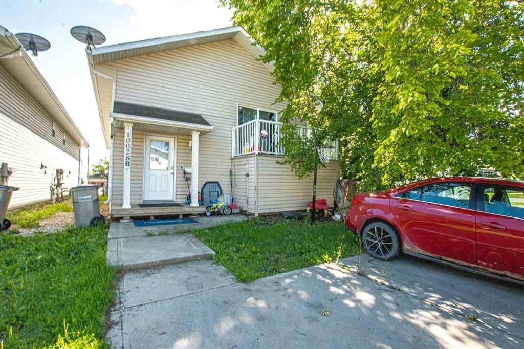 MLS® A2247065 - Unit #A&B 10028 104 Avenue  in Avondale Grande Prairie, Residential