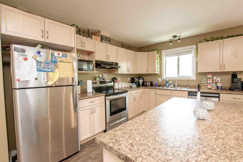 MLS® A2247065 - Unit #A&B 10028 104 Avenue  in Avondale Grande Prairie, Residential
