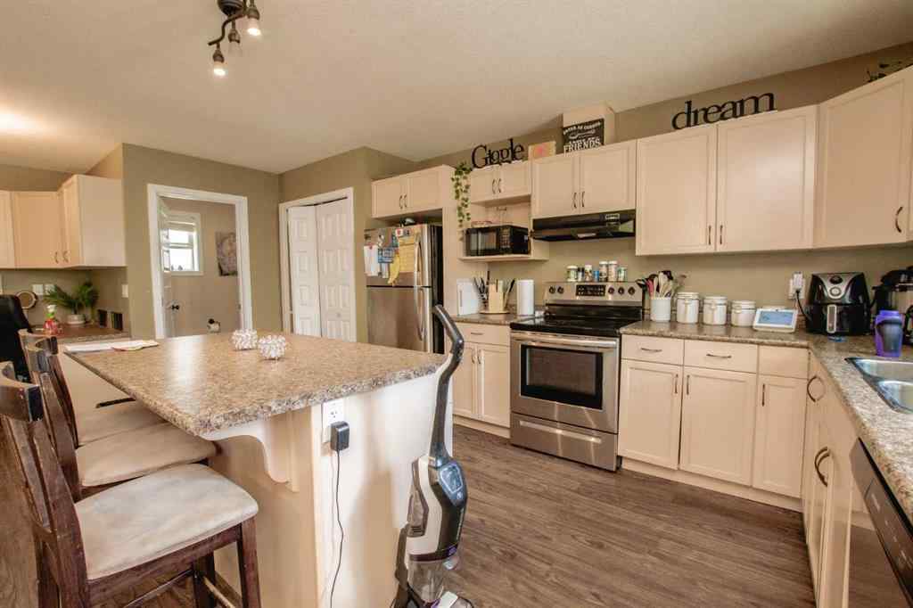 MLS® A2247065 - Unit #A&B 10028 104 Avenue  in Avondale Grande Prairie, Residential