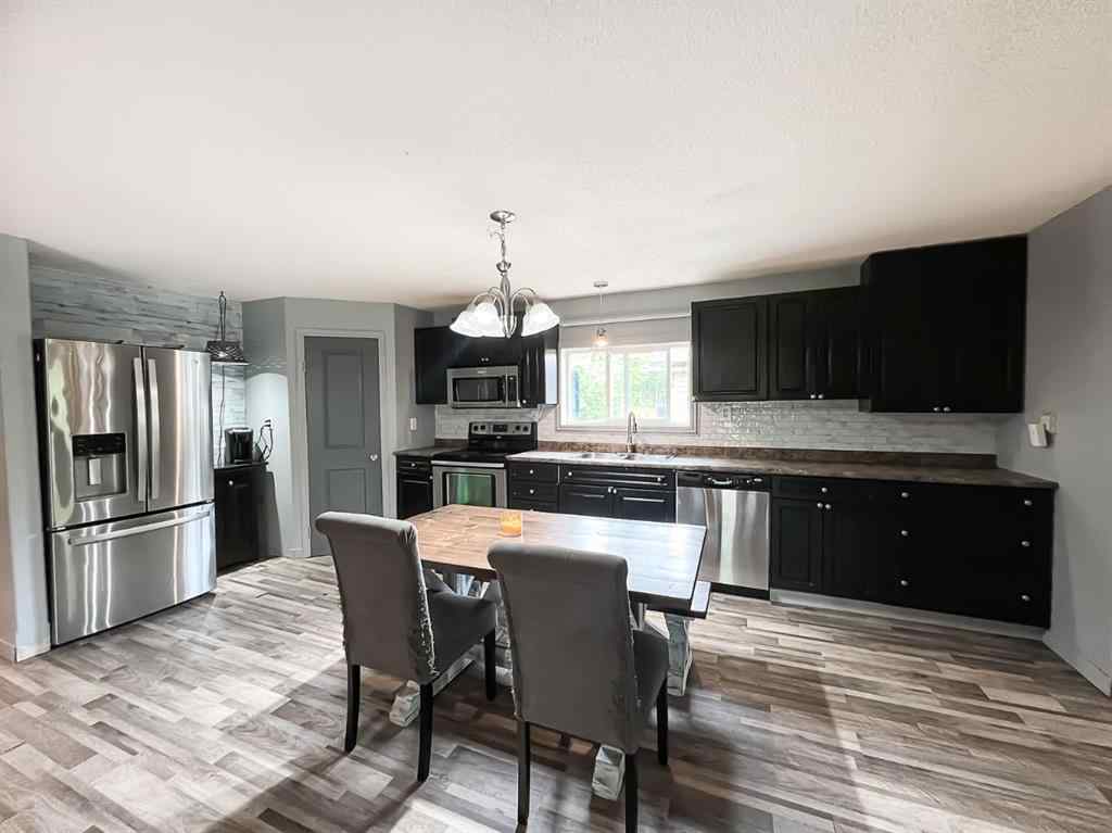 MLS® A2247087 - 21 Erlam Street  in NONE McLennan, Residential