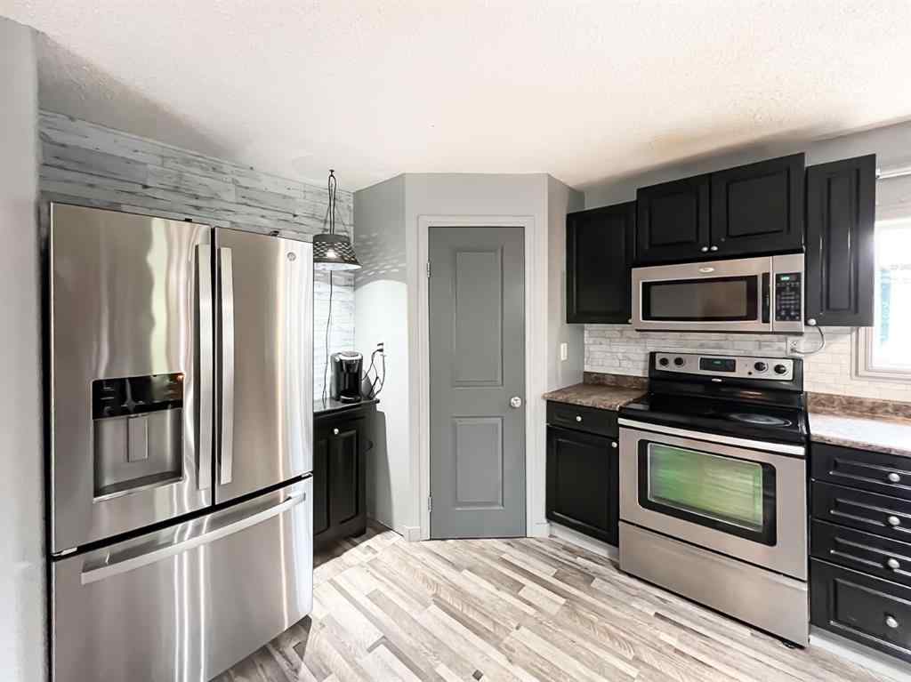 MLS® A2247087 - 21 Erlam Street  in NONE McLennan, Residential