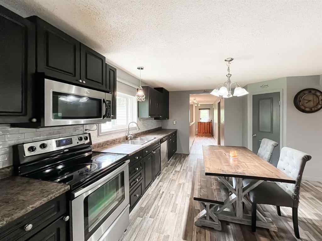 MLS® A2247087 - 21 Erlam Street  in NONE McLennan, Residential