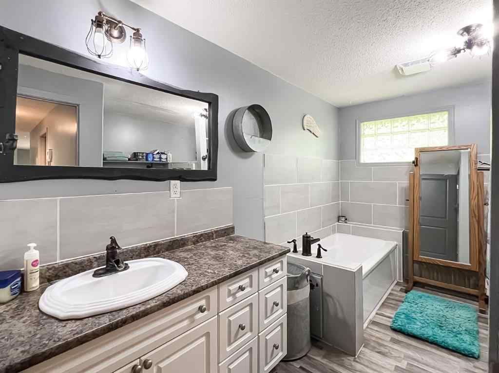 MLS® A2247087 - 21 Erlam Street  in NONE McLennan, Residential