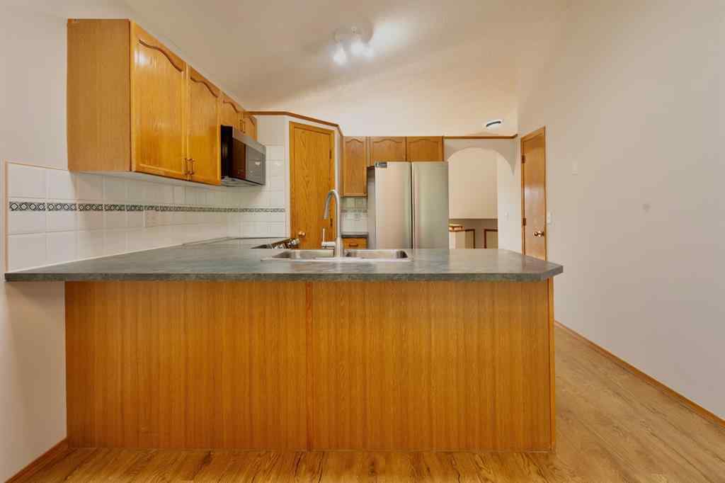 MLS® A2247109 - 18 Springs Crescent SE in Big Springs Airdrie, Residential