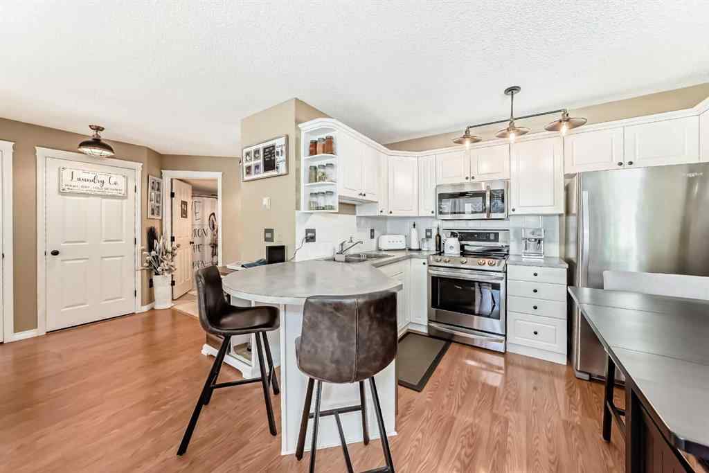 MLS® A2247131 - Unit #204 6900 Hunterview Drive NW in Huntington Hills Calgary, Residential