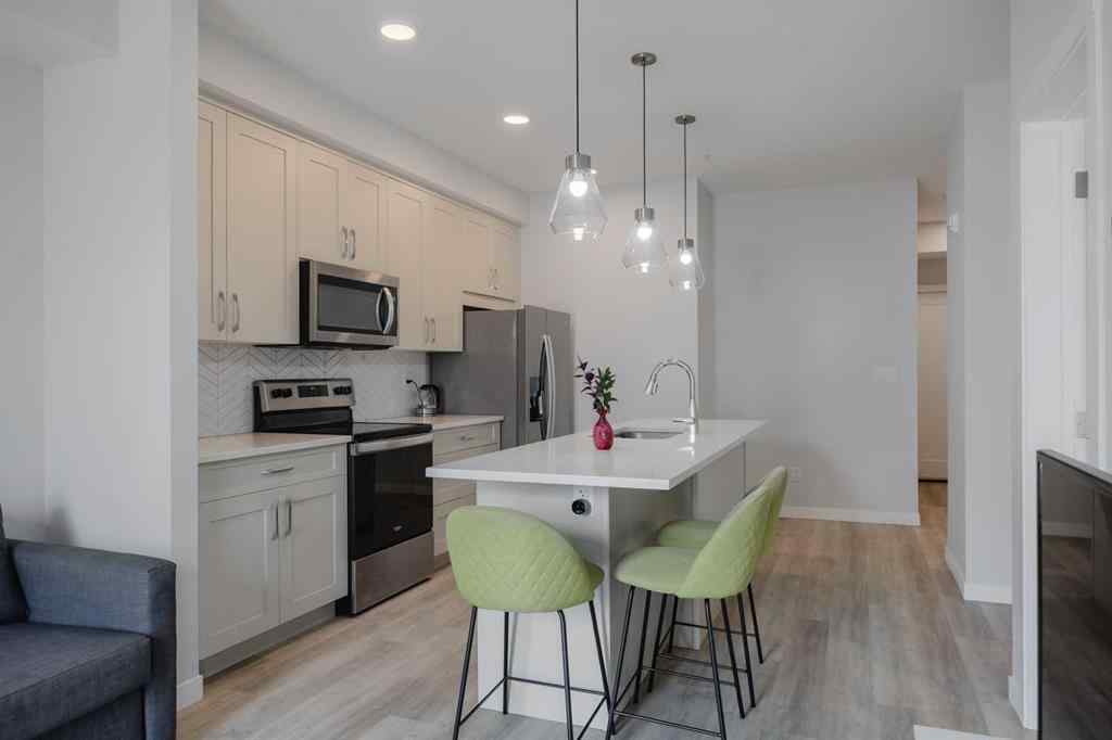 MLS® A2247150 - Unit #102 200 Shawnee Square SW in Shawnee Slopes Calgary, Residential