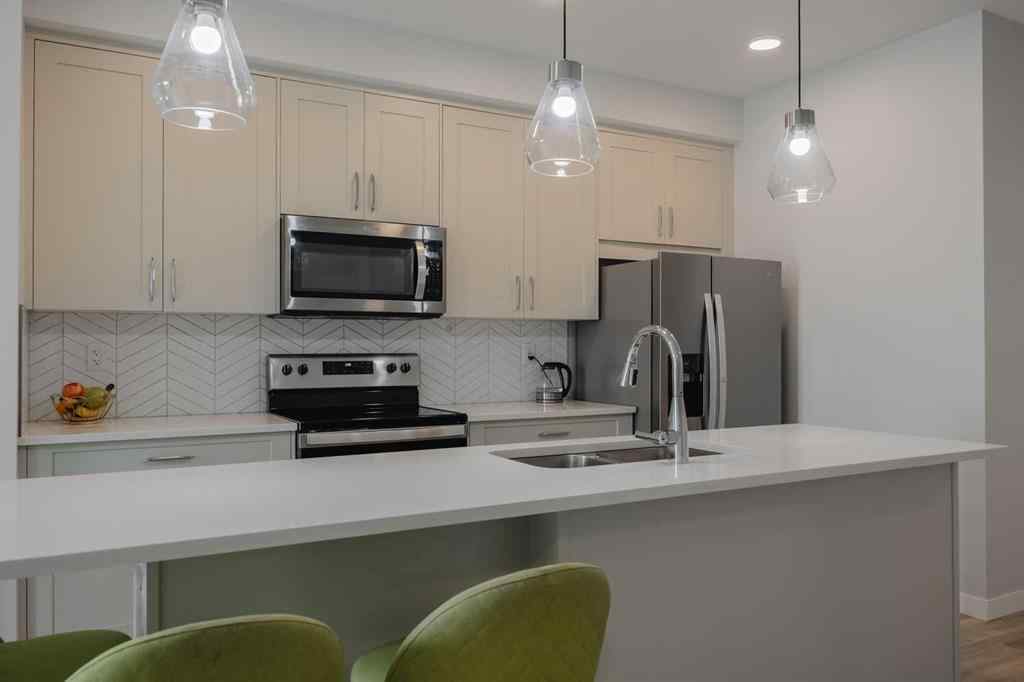 MLS® A2247150 - Unit #102 200 Shawnee Square SW in Shawnee Slopes Calgary, Residential