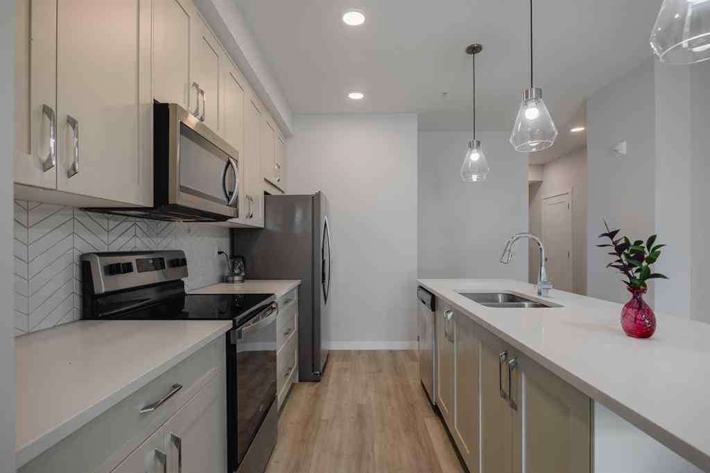 MLS® A2247150 - Unit #102 200 Shawnee Square SW in Shawnee Slopes Calgary, Residential