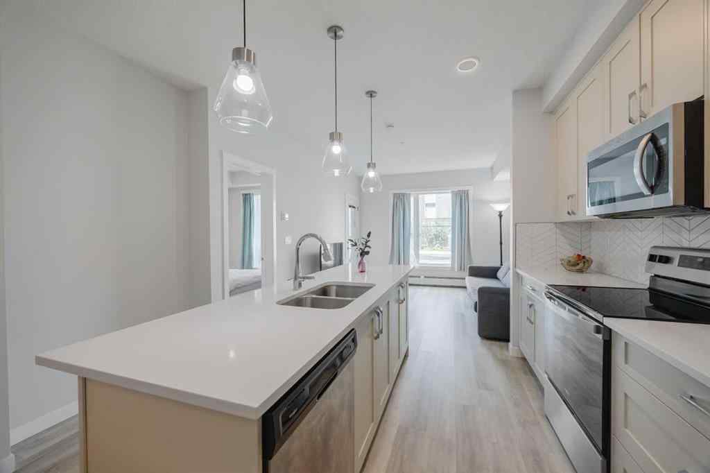 MLS® A2247150 - Unit #102 200 Shawnee Square SW in Shawnee Slopes Calgary, Residential
