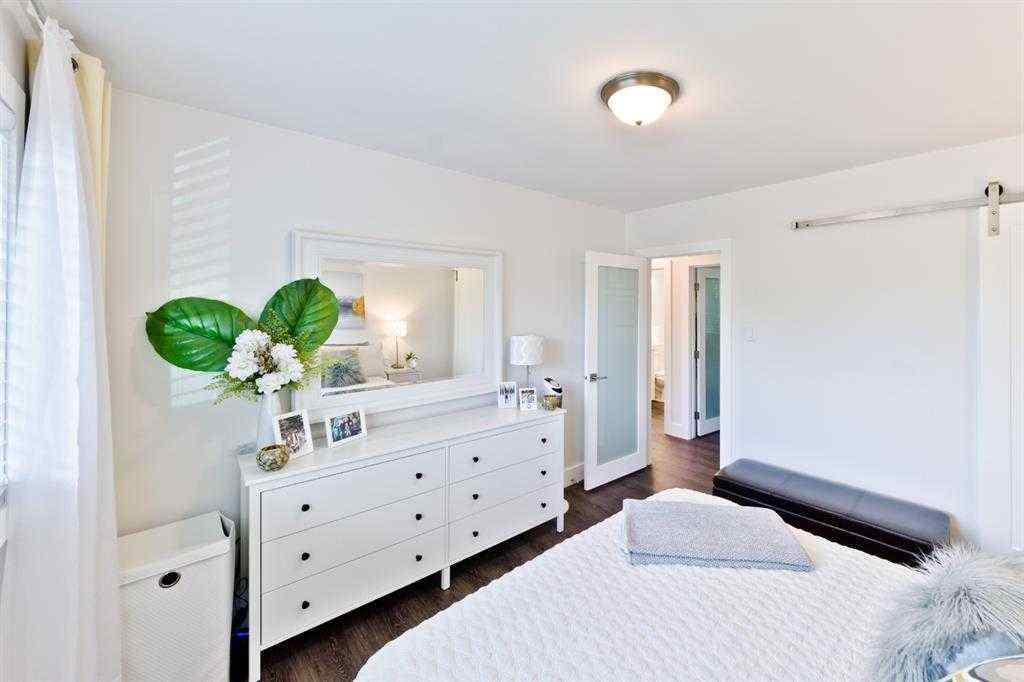 MLS® A2247153 - 805 67 Avenue SW in Kingsland Calgary, Residential