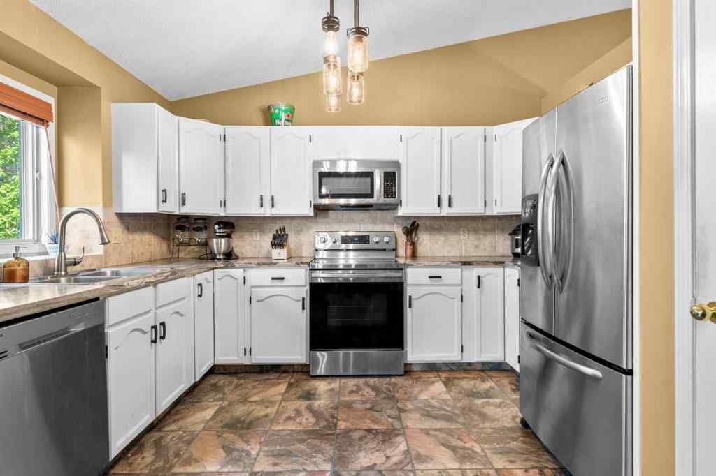 MLS® A2247174 - 87 Sun Harbour Close SE in Sundance Calgary, Residential