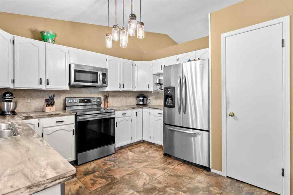 MLS® A2247174 - 87 Sun Harbour Close SE in Sundance Calgary, Residential