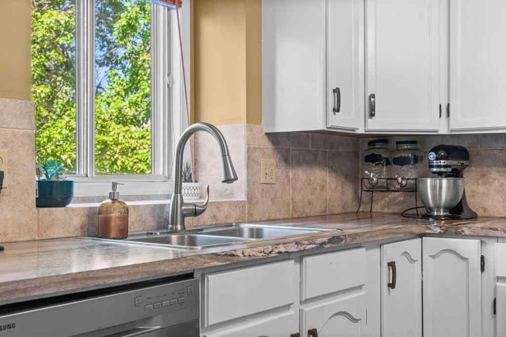 MLS® A2247174 - 87 Sun Harbour Close SE in Sundance Calgary, Residential