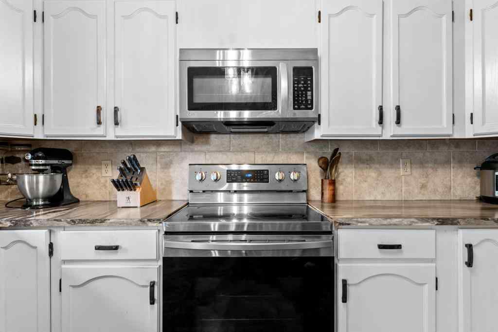 MLS® A2247174 - 87 Sun Harbour Close SE in Sundance Calgary, Residential