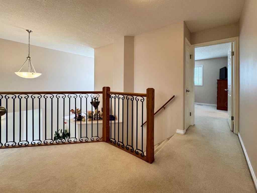 MLS® A2247192 - 225 Cougar Way N in Uplands Lethbridge, Residential