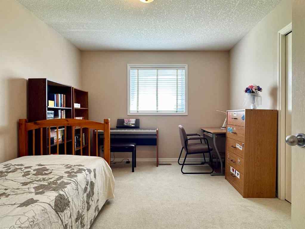 MLS® A2247192 - 225 Cougar Way N in Uplands Lethbridge, Residential