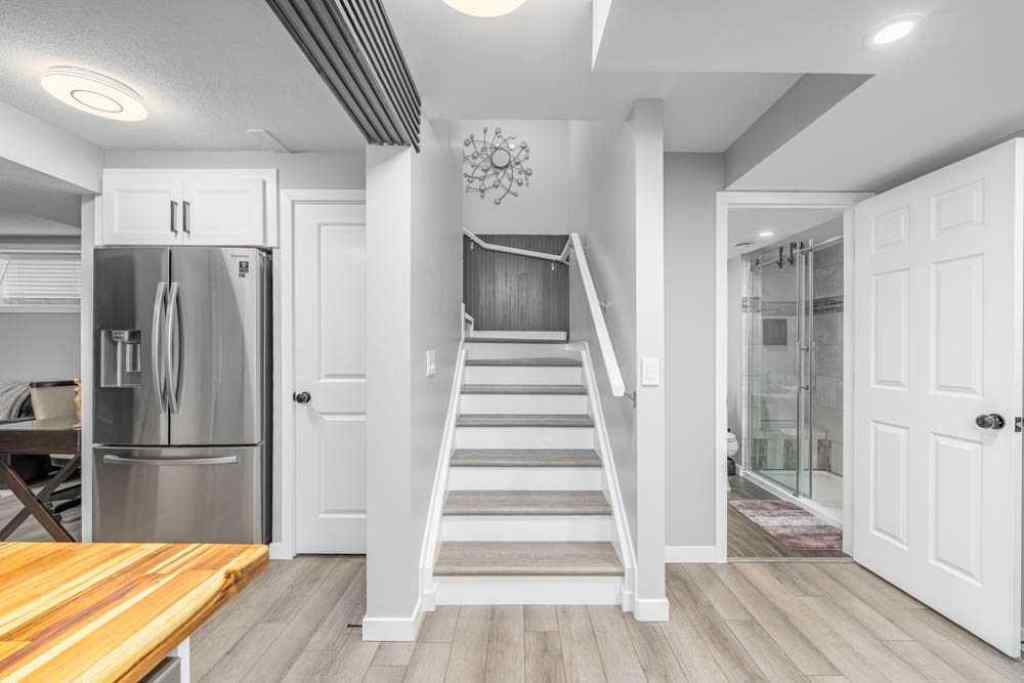 MLS® A2247196 - 105 Lawthorn Greenway SE in Lanark Airdrie, Residential