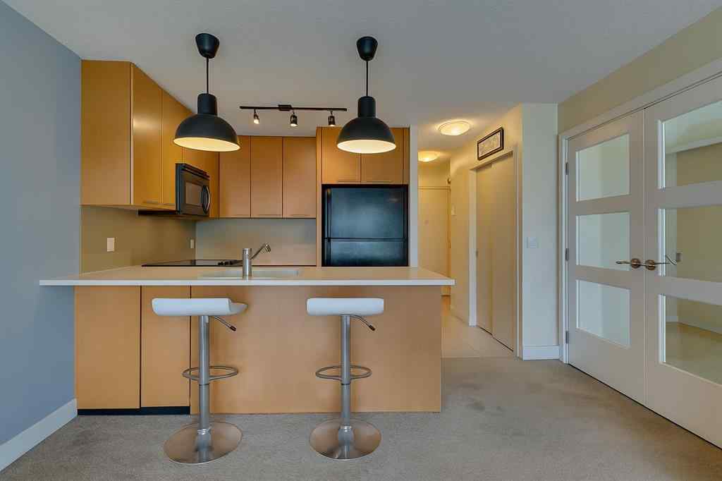 MLS® A2247222 - Unit #450 35 Richard Court SW in Lincoln Park Calgary, Residential