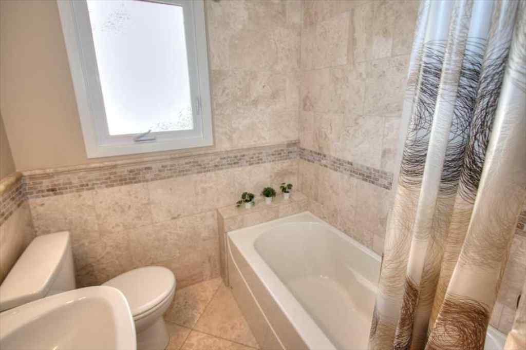 MLS® A2247244 - 1604 Scotland Street SW in Scarboro Calgary, Residential