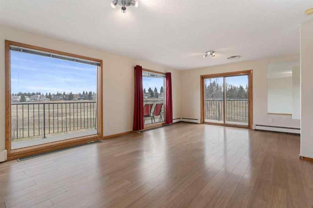 MLS® A2247245 - 1008 Shawnee Drive SW in Shawnee Slopes Calgary, Residential