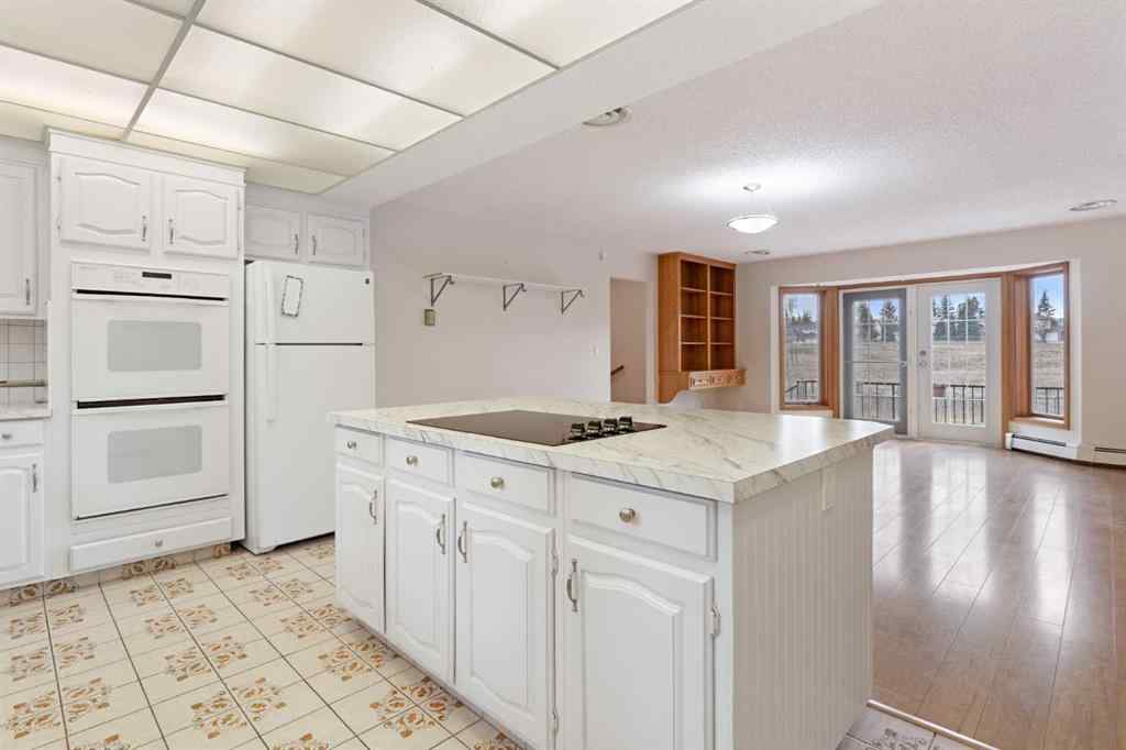 MLS® A2247245 - 1008 Shawnee Drive SW in Shawnee Slopes Calgary, Residential
