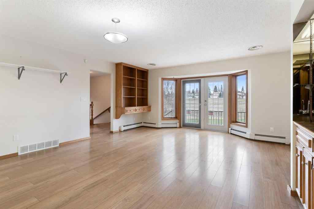 MLS® A2247245 - 1008 Shawnee Drive SW in Shawnee Slopes Calgary, Residential