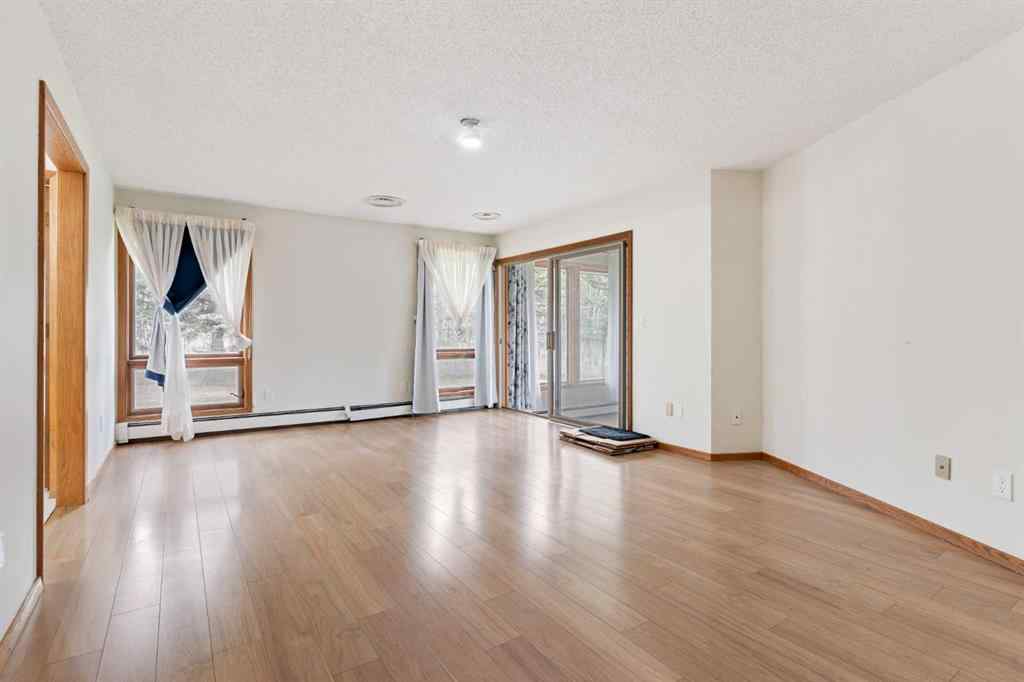 MLS® A2247245 - 1008 Shawnee Drive SW in Shawnee Slopes Calgary, Residential