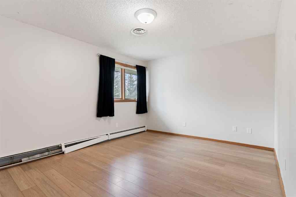 MLS® A2247245 - 1008 Shawnee Drive SW in Shawnee Slopes Calgary, Residential