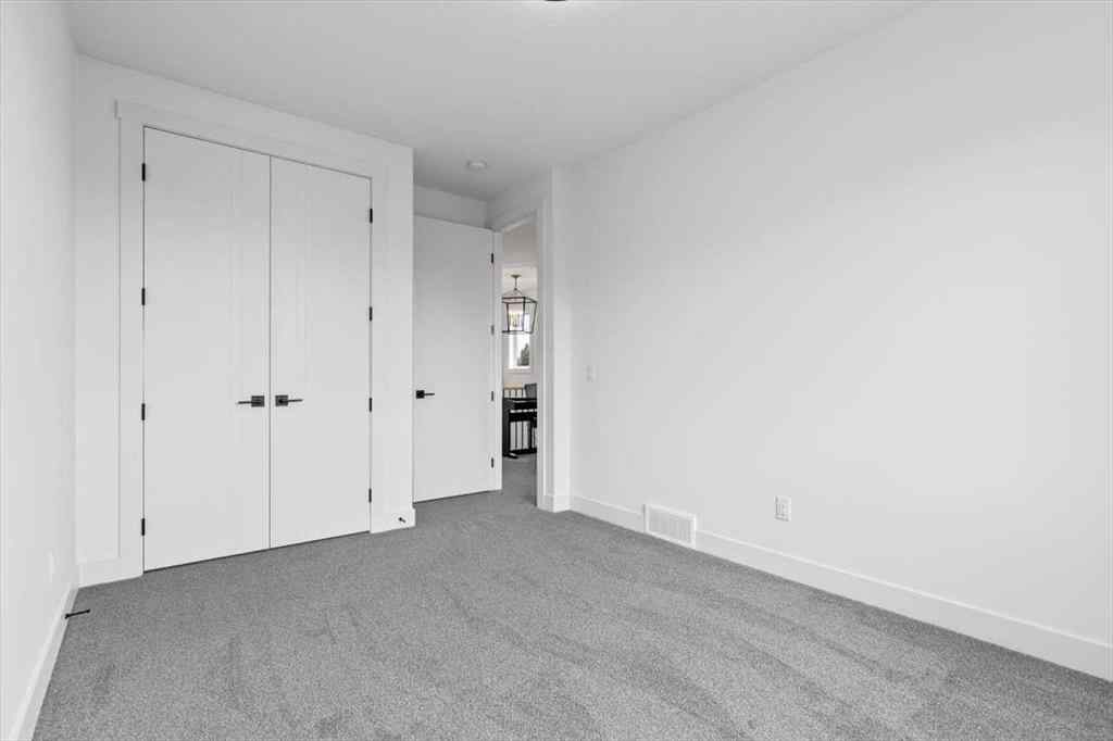 MLS® A2247249 - 906 39 Street SW in Rosscarrock Calgary, Residential