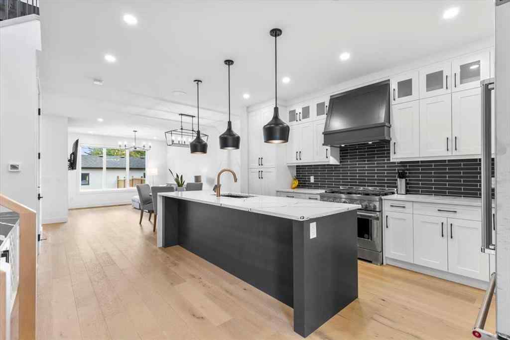 MLS® A2247249 - 906 39 Street SW in Rosscarrock Calgary, Residential