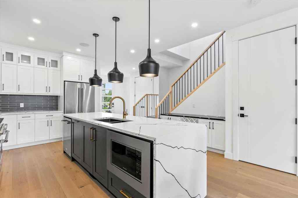 MLS® A2247249 - 906 39 Street SW in Rosscarrock Calgary, Residential