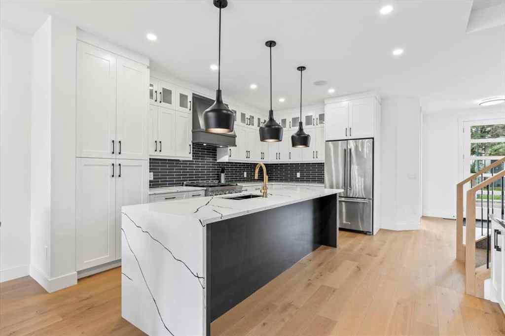 MLS® A2247249 - 906 39 Street SW in Rosscarrock Calgary, Residential