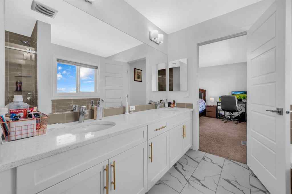 MLS® A2247268 - 127 Ambleside Crescent NW in Moraine Calgary, Residential