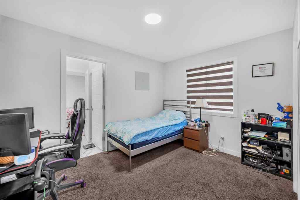 MLS® A2247268 - 127 Ambleside Crescent NW in Moraine Calgary, Residential