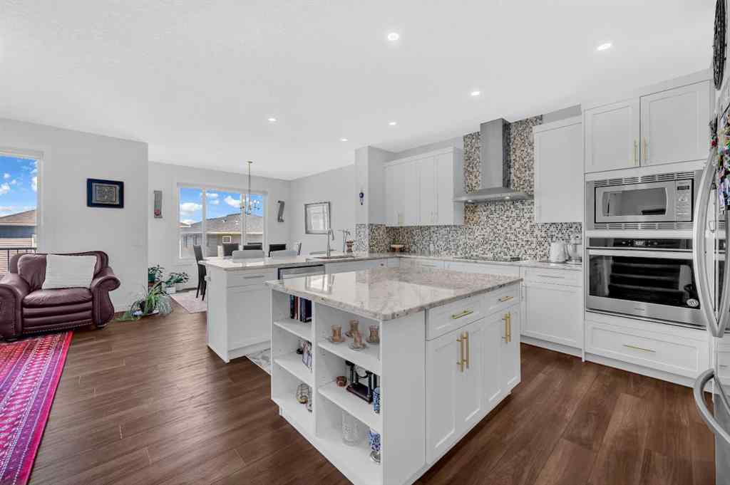 MLS® A2247268 - 127 Ambleside Crescent NW in Moraine Calgary, Residential