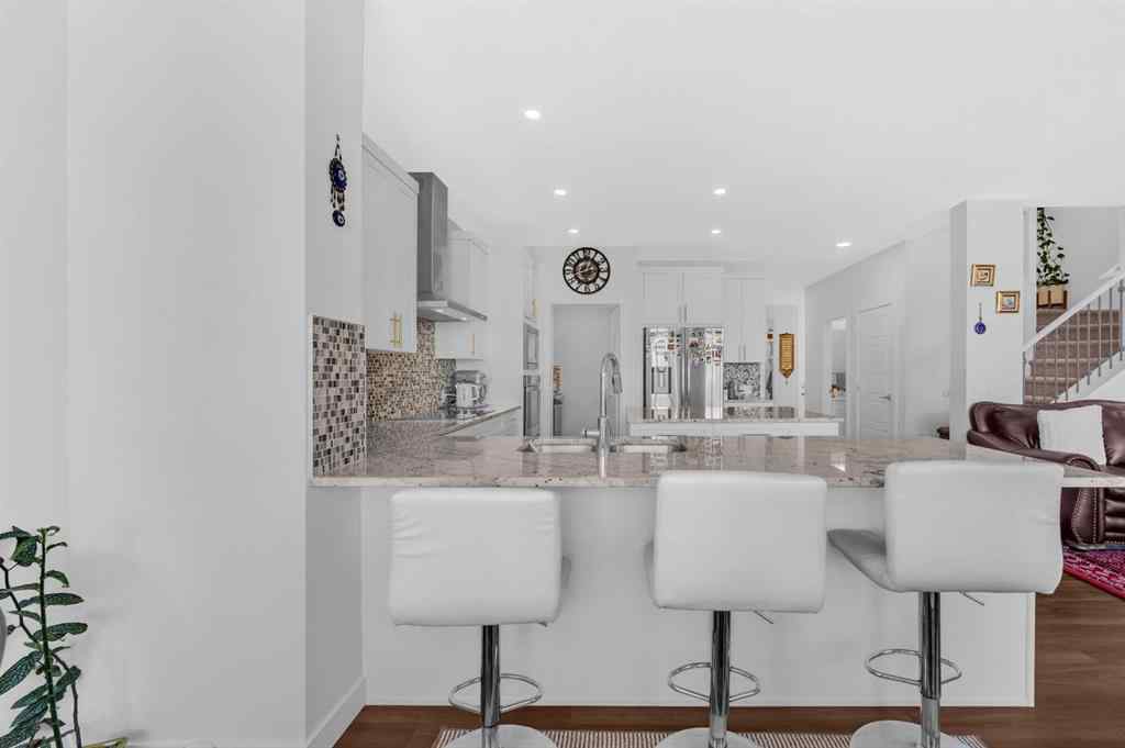 MLS® A2247268 - 127 Ambleside Crescent NW in Moraine Calgary, Residential