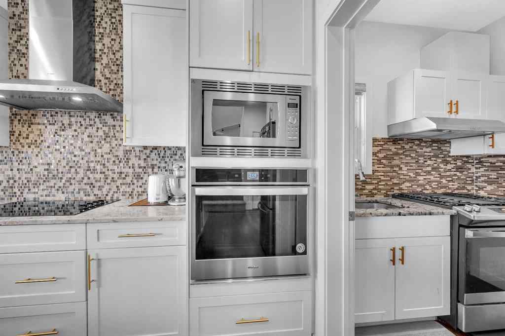 MLS® A2247268 - 127 Ambleside Crescent NW in Moraine Calgary, Residential