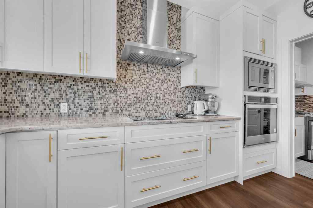MLS® A2247268 - 127 Ambleside Crescent NW in Moraine Calgary, Residential