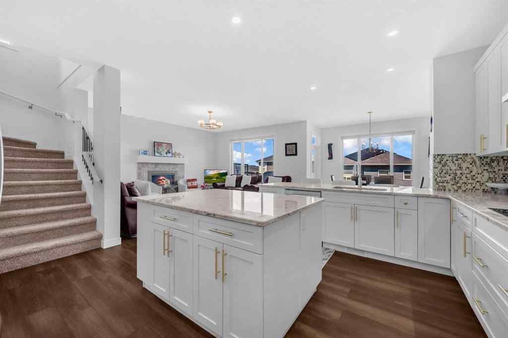 MLS® A2247268 - 127 Ambleside Crescent NW in Moraine Calgary, Residential