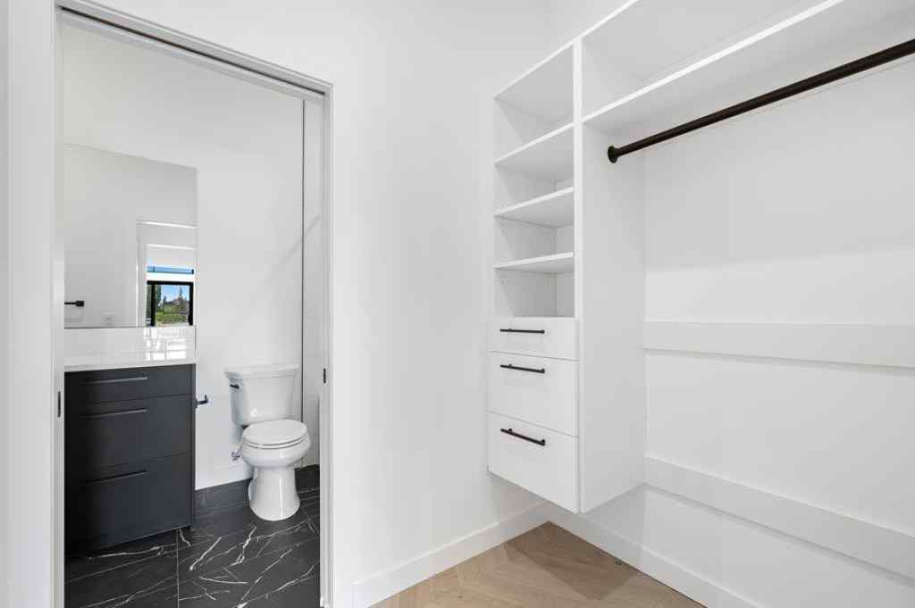 MLS® A2247280 - Unit #112 835 78 Street SW in West Springs Calgary, Residential