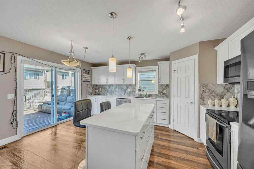 MLS® A2247288 - 1035 Windhaven Close SW in Windsong Airdrie, Residential