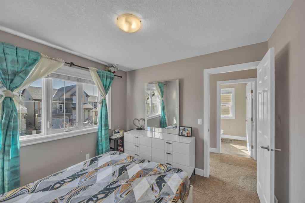 MLS® A2247288 - 1035 Windhaven Close SW in Windsong Airdrie, Residential