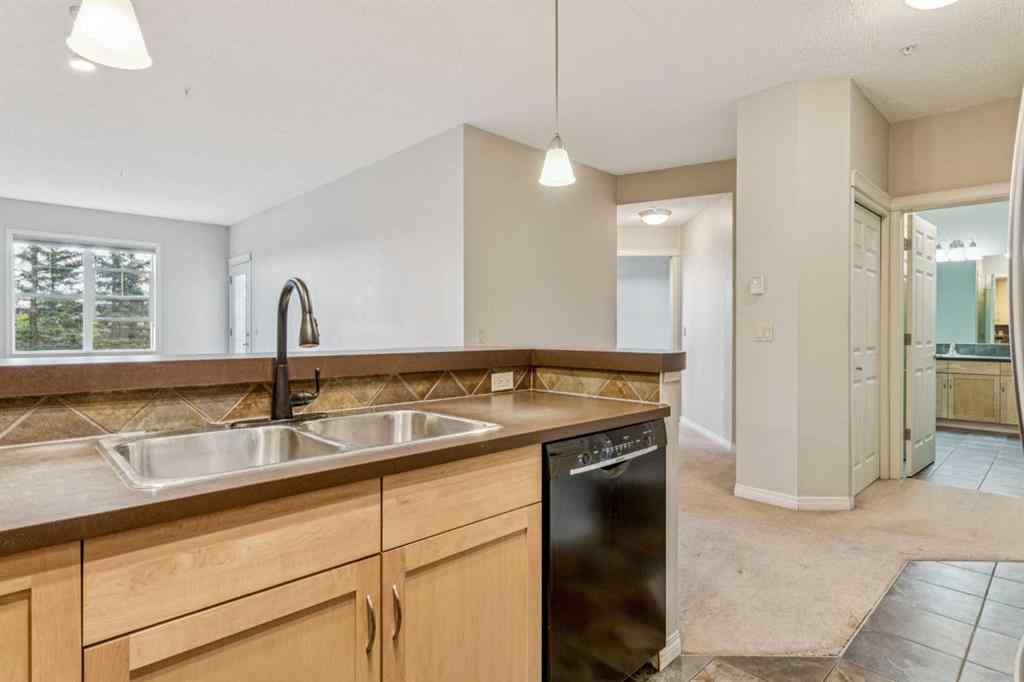 MLS® A2247292 - Unit #209 37 Prestwick Drive SE in McKenzie Towne Calgary, Residential