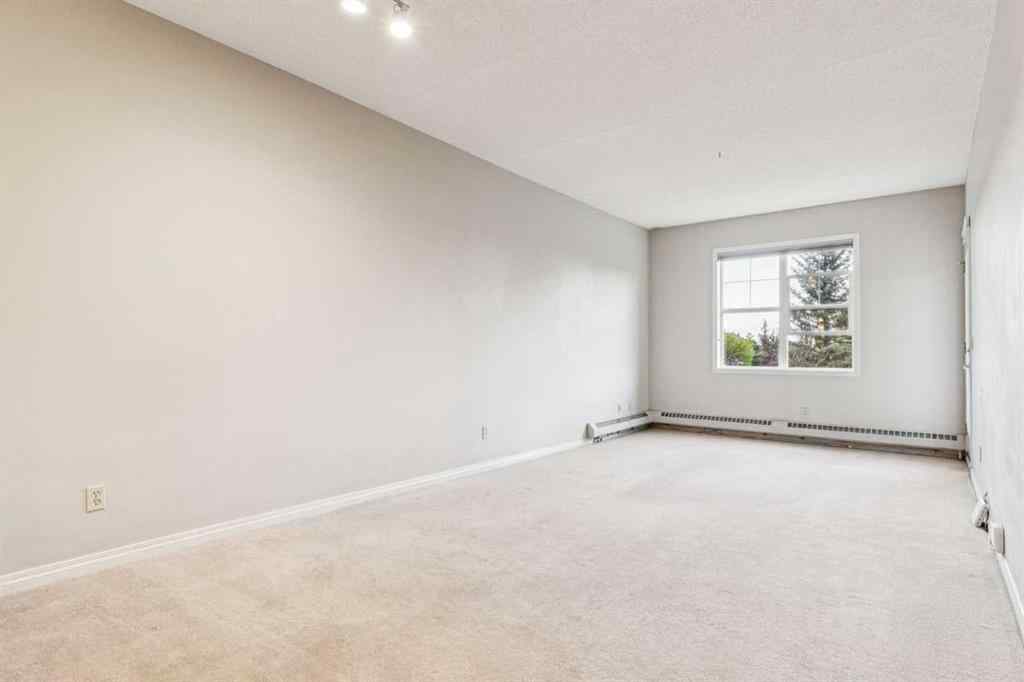 MLS® A2247292 - Unit #209 37 Prestwick Drive SE in McKenzie Towne Calgary, Residential