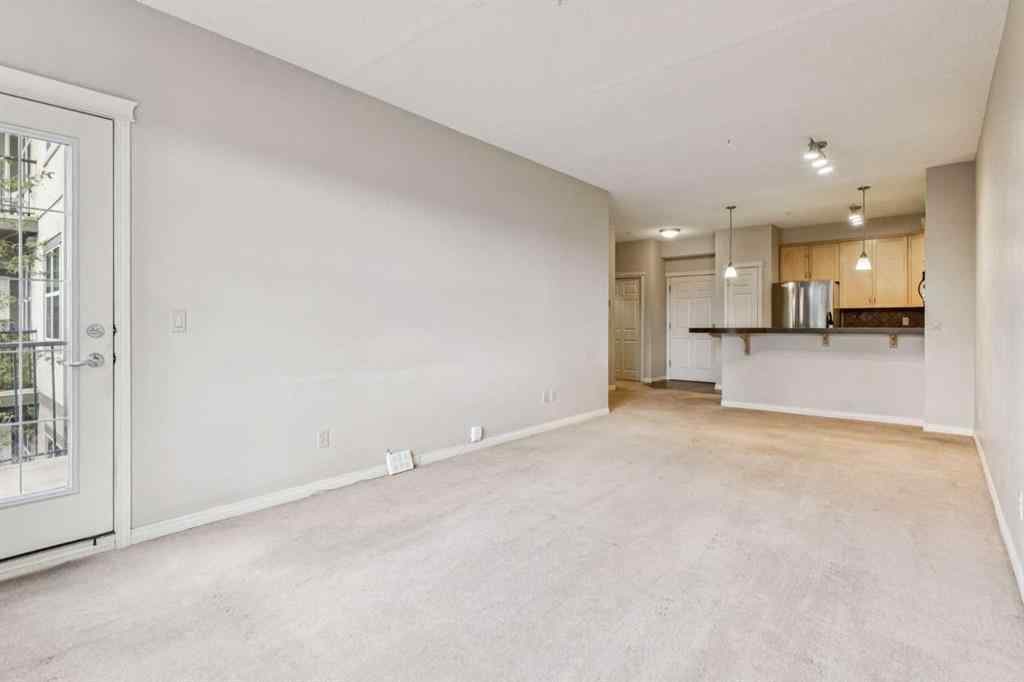 MLS® A2247292 - Unit #209 37 Prestwick Drive SE in McKenzie Towne Calgary, Residential