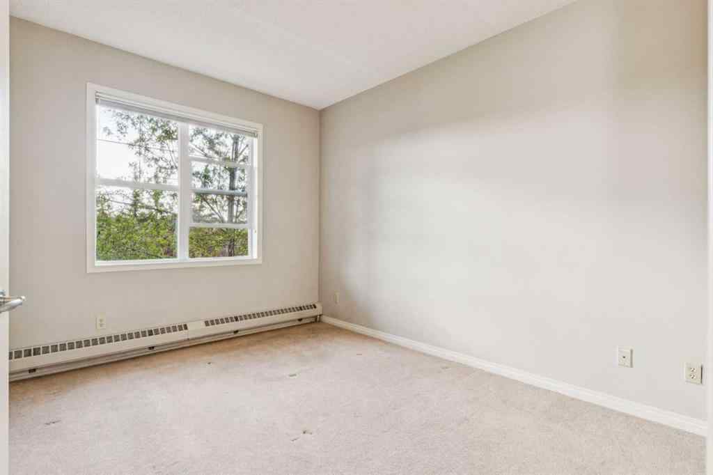 MLS® A2247292 - Unit #209 37 Prestwick Drive SE in McKenzie Towne Calgary, Residential